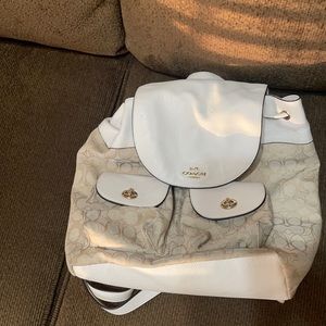A white coach backpack